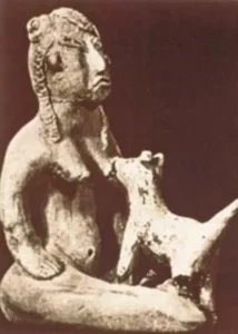 Olmekische Ton-Skulptur einer Frau, die einen jungen Hund an der Brust nährt, Tlatilco (Mexiko), ca. 1.300-800 v. Chr.
